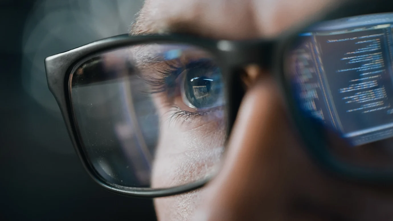 man looking at code