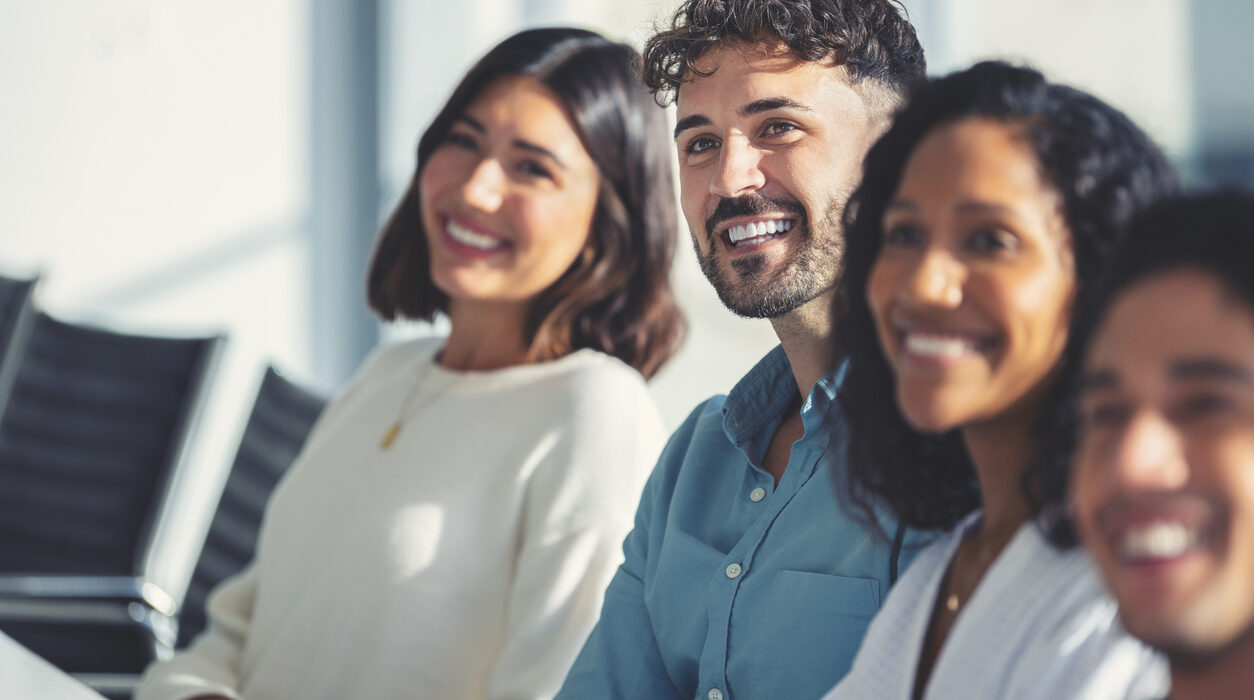 Group of people listening to a presentation