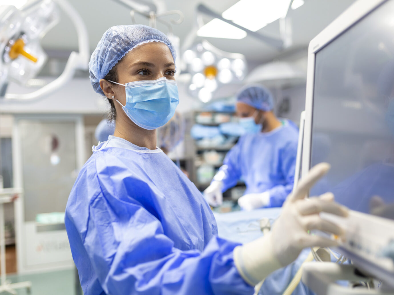 surgeon looking at screen