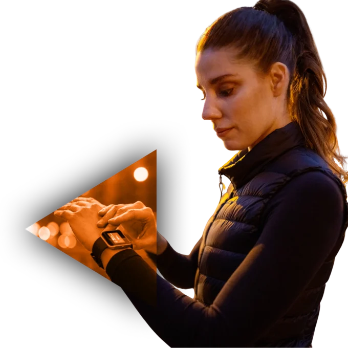 woman looking in her smart watch