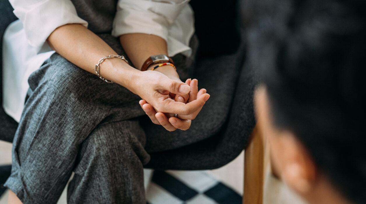 Close-up of woman's hands during counseling meeting
