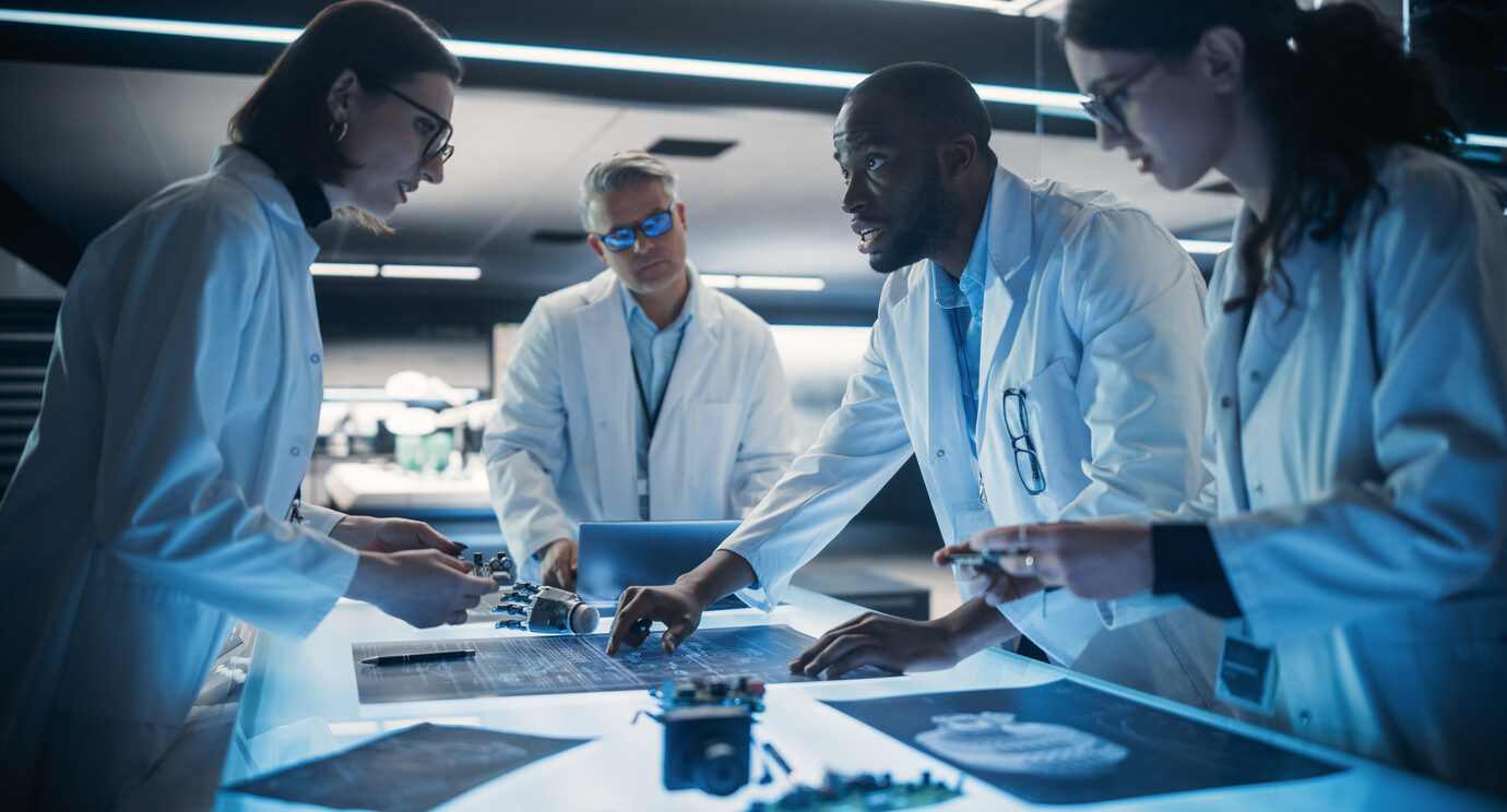 Team of Industrial Robotics Specialists Working on Innovative Prosthetic Hands