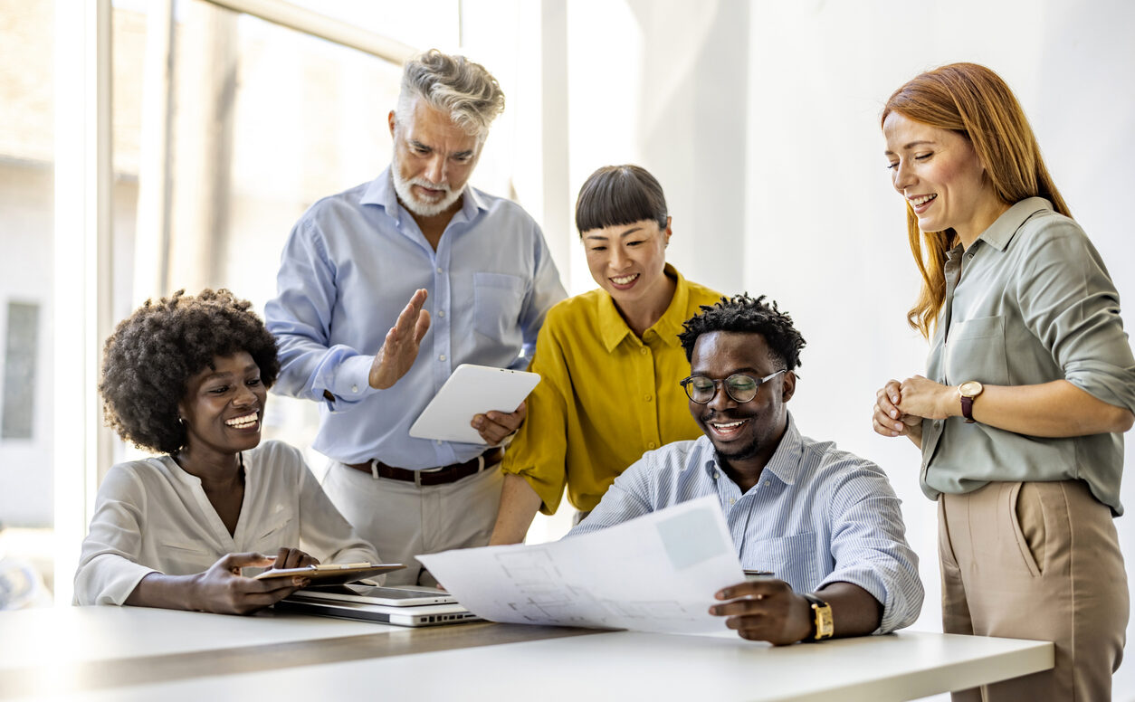 group of professionals collaborating around a table