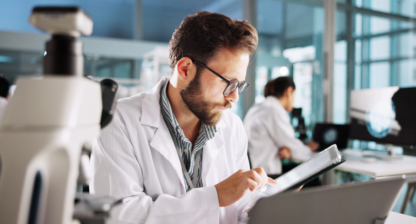 Scientist, man and tablet with research for biology